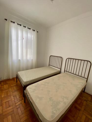 Postel nebo postele na pokoji v ubytování Casa Campos Centro - Perto de Tudo!