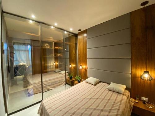 En eller flere senge i et værelse på Ap FRENTE AO MAR - BEIRA MAR