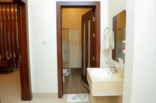 Bilik mandi di سماية للشقق الفندقية