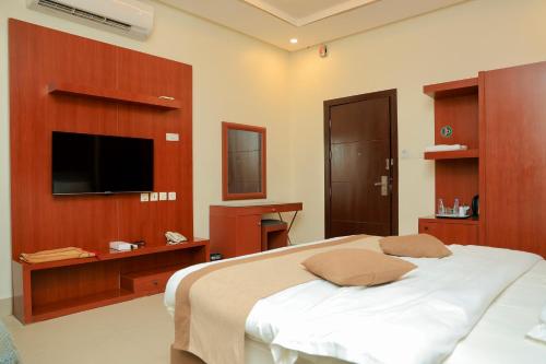 Katil atau katil-katil dalam bilik di سماية للشقق الفندقية