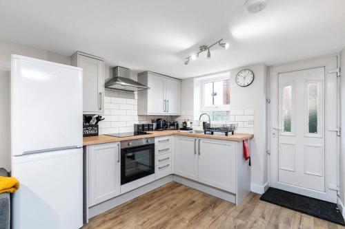 Η κουζίνα ή μικρή κουζίνα στο Cosy One Bed Apt in Leeds City