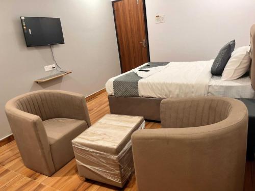 Μια τηλεόραση ή/και κέντρο ψυχαγωγίας στο Townhouse Financial District Circle Hyderabad