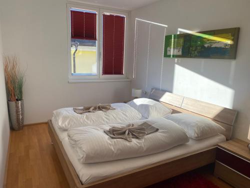 Postel nebo postele na pokoji v ubytování Penthouse TAMINO TOP 11