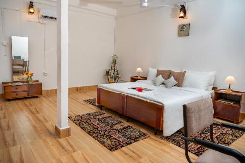 Ένα ή περισσότερα κρεβάτια σε δωμάτιο στο amã Stays & Trails - Hathikuli , Assam