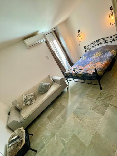 Ένα ή περισσότερα κρεβάτια σε δωμάτιο στο Studio cœur de ville