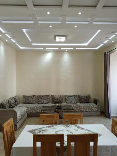 O zonă de relaxare la Appartement Néoclassique centre -ville