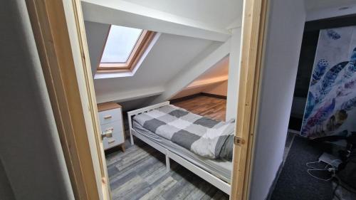 Ένα ή περισσότερα κρεβάτια σε δωμάτιο στο Bed and Blue by the Beach