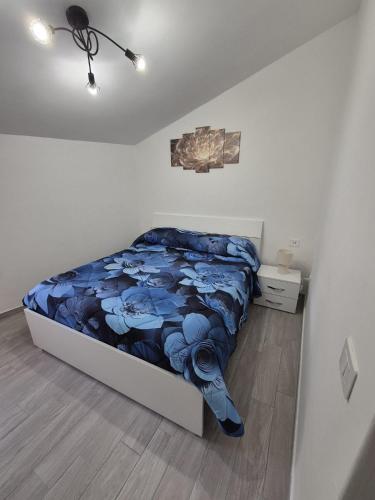 Ένα ή περισσότερα κρεβάτια σε δωμάτιο στο Residenza Stella