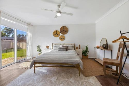 Ένα ή περισσότερα κρεβάτια σε δωμάτιο στο Heated Pool Fireplace Games Room and Pet Friendly