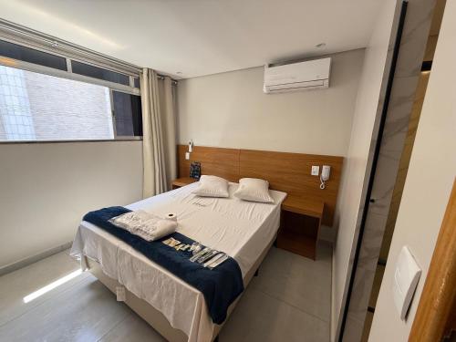 Postel nebo postele na pokoji v ubytování Hotel New Brás