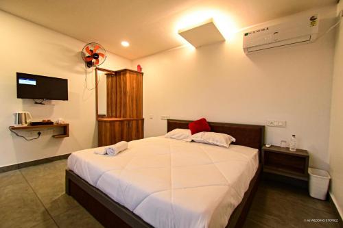 Postel nebo postele na pokoji v ubytování Mistyloft by East West