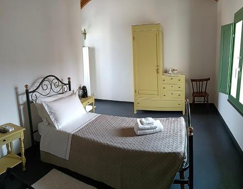 Ένα ή περισσότερα κρεβάτια σε δωμάτιο στο La Casa Vecchia