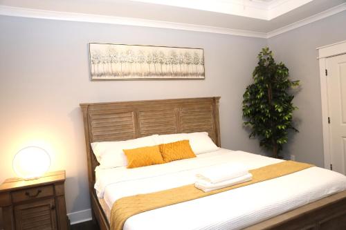 a bedroom with a bed and a christmas tree at Highway Oasis and Myrtle Beach in Arrowood