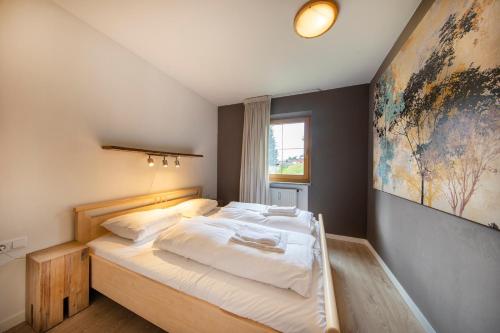 Postel nebo postele na pokoji v ubytování Dorfplatz Top 38