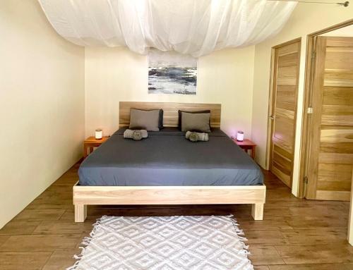 Postel nebo postele na pokoji v ubytování Paradiselodge - Casa Linda