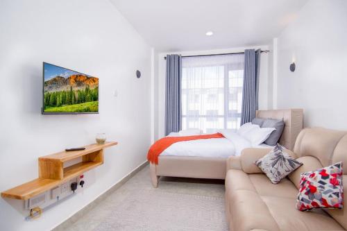 Ένα ή περισσότερα κρεβάτια σε δωμάτιο στο Royal suburbs by Tsavo