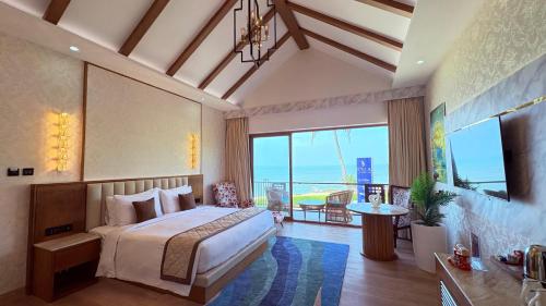 Postel nebo postele na pokoji v ubytování SCYLLA Luxury Resort & Spa