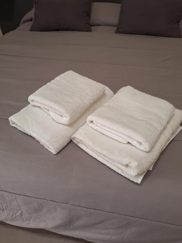 Llit o llits en una habitació de Tarchon Luxury B&B