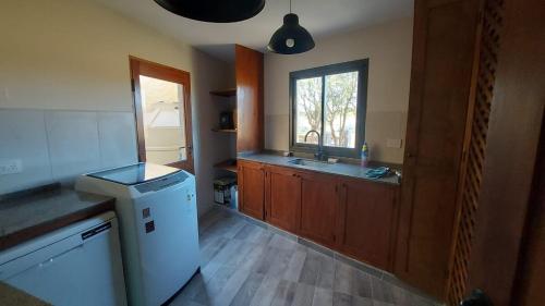 Kuchyň nebo kuchyňský kout v ubytování Casa en Estancias de Cafayate A38