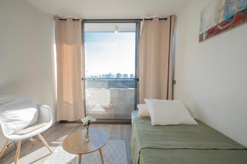 Гостиная зона в Alojamiento moderno y bien conectado a pasos del Metro y centros urbanos