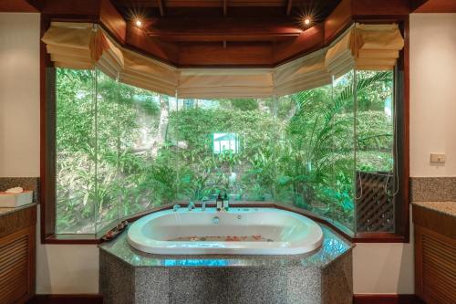 Φωτογραφία από το άλμπουμ του Surin Ayara Villas by Stayisle σε Surin Beach