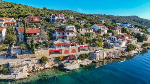 an aerial view of a town on the water at Apartments Ivan in Vinišće