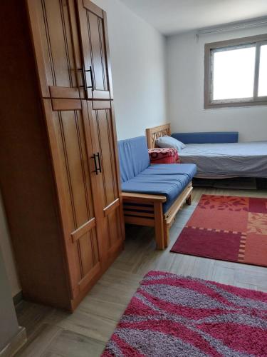 Postel nebo postele na pokoji v ubytování Cozy studio