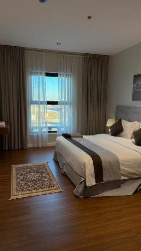 Ένα ή περισσότερα κρεβάτια σε δωμάτιο στο WEEK END IN FoR Serviced APARTMENTS