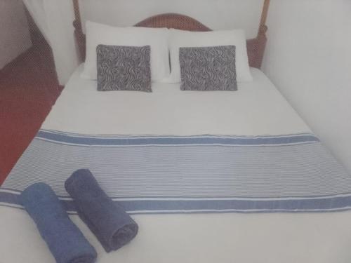 Ένα ή περισσότερα κρεβάτια σε δωμάτιο στο LC&S Homestay Mirssa