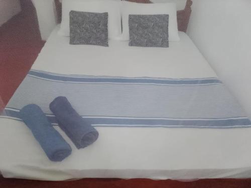 Ένα ή περισσότερα κρεβάτια σε δωμάτιο στο LC&S Homestay Mirssa