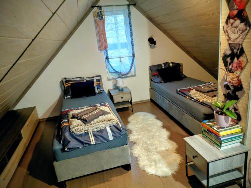 Postel nebo postele na pokoji v ubytování Agroturystyka u Cezarego