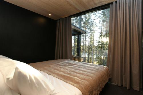 Ένα ή περισσότερα κρεβάτια σε δωμάτιο στο Noa Villas Adults Only Riverside Resort