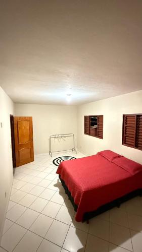 Giường trong phòng chung tại Pousada cosmo