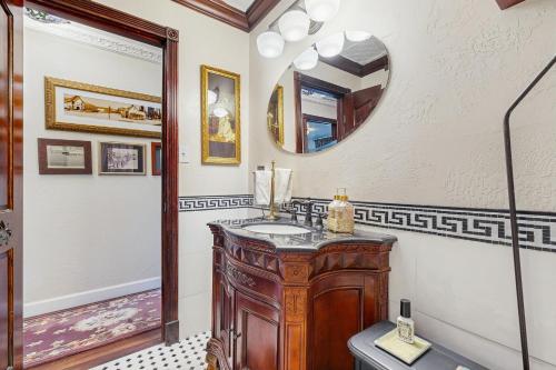 a bathroom with a sink and a mirror at Ranchita Avalon in Sierraville