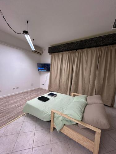 Ένα ή περισσότερα κρεβάτια σε δωμάτιο στο Villesse Centro