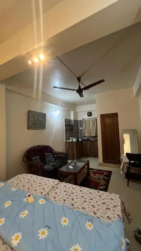 Ένα ή περισσότερα κρεβάτια σε δωμάτιο στο Mannat