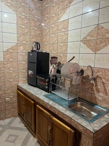 Fotografija u galeriji objekta Aristo Immobilier u gradu Bafoussam