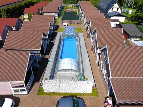 Fotografie z fotogalerie ubytování Holiday homes with swimming pool, Miedzyzdroje v destinaci Międzyzdroje