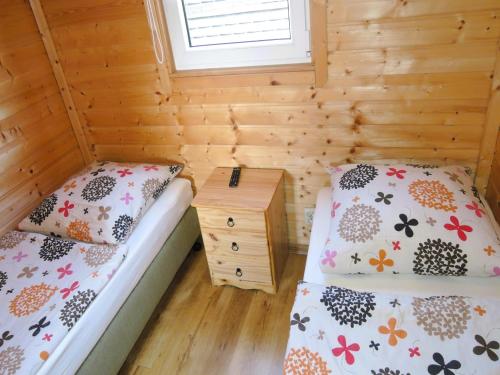 Ένα ή περισσότερα κρεβάτια σε δωμάτιο στο Holiday homes with swimming pool, Miedzyzdroje