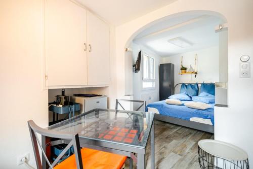 Ένα ή περισσότερα κρεβάτια σε δωμάτιο στο My Collioure - La Suite - Sauna, Spa & Beach