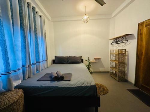 Postel nebo postele na pokoji v ubytování Turtle Sea Guest & Restaurants