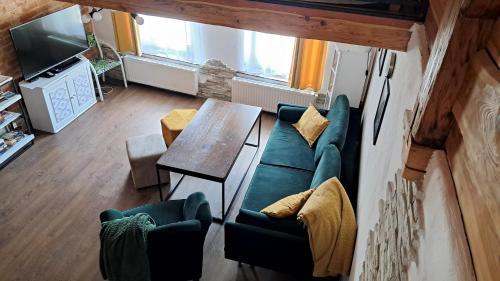 Χώρος καθιστικού στο Loft Szczytna