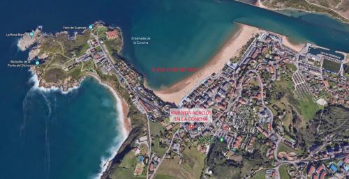 een kaart van een resort bij het strand bij Acacios en La Concha in Suances