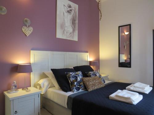 Postel nebo postele na pokoji v ubytování Le Castel Home Nîmes