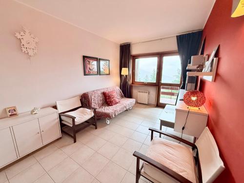 Posezení v ubytování Baita Arancio By DomusExtra