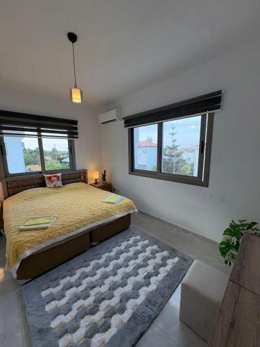 Postel nebo postele na pokoji v ubytování Lapta Residence