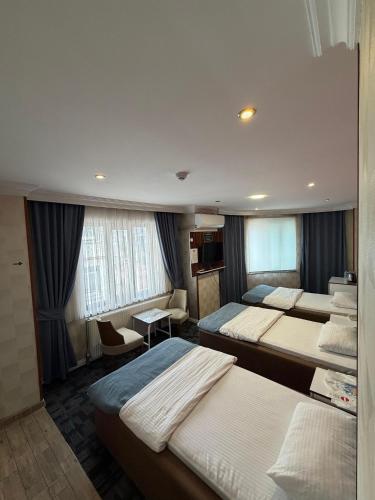 Ένα ή περισσότερα κρεβάτια σε δωμάτιο στο Hotel Dosco