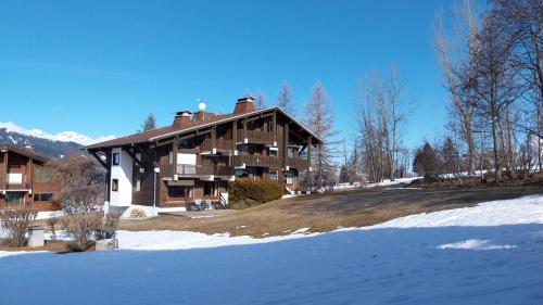 F1 tout confort Megève skis aux pieds