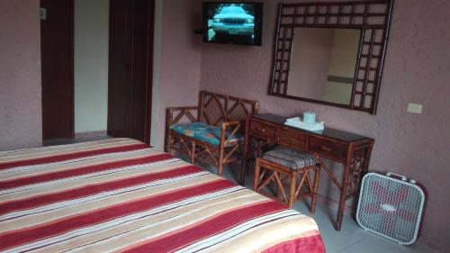 Katil atau katil-katil dalam bilik di Hotel Angela Carolina