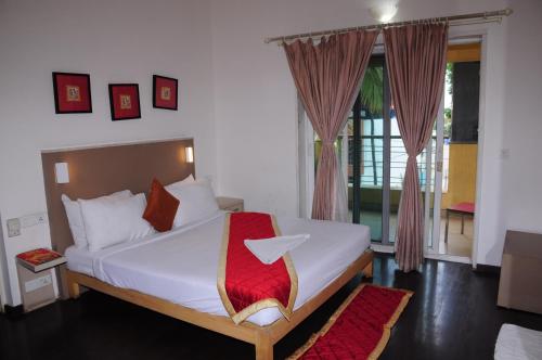 Ένα ή περισσότερα κρεβάτια σε δωμάτιο στο AMC COMFORTS Brigdgestay